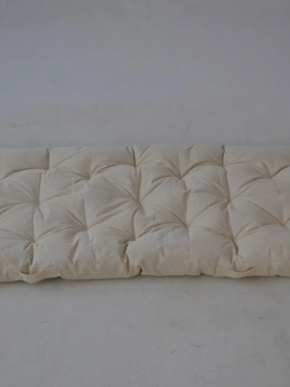Cream Rolled Comforter Mattress Topper